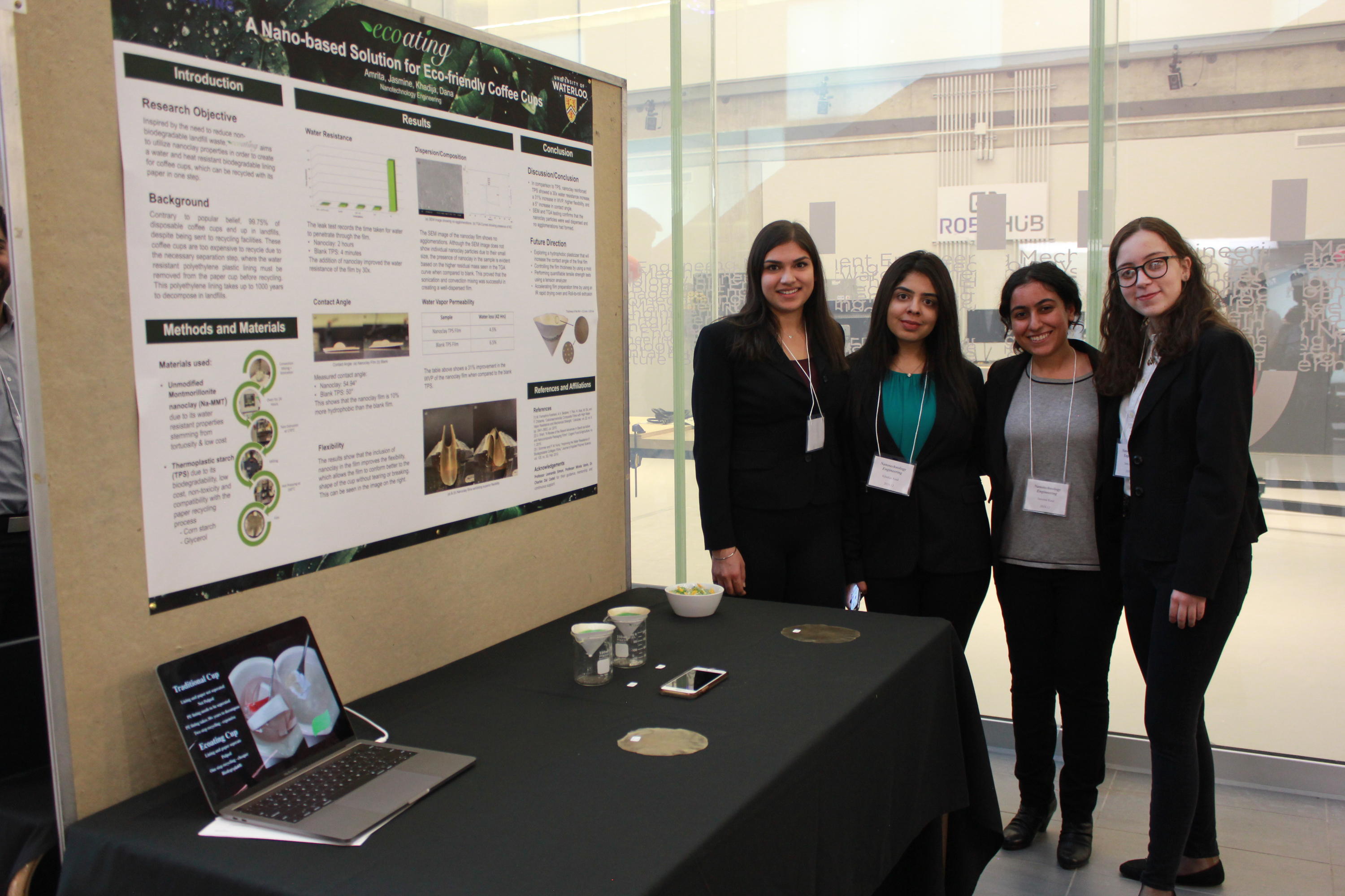 Team 12 students with their project poster at the 2019 Capstone Design Symposium.