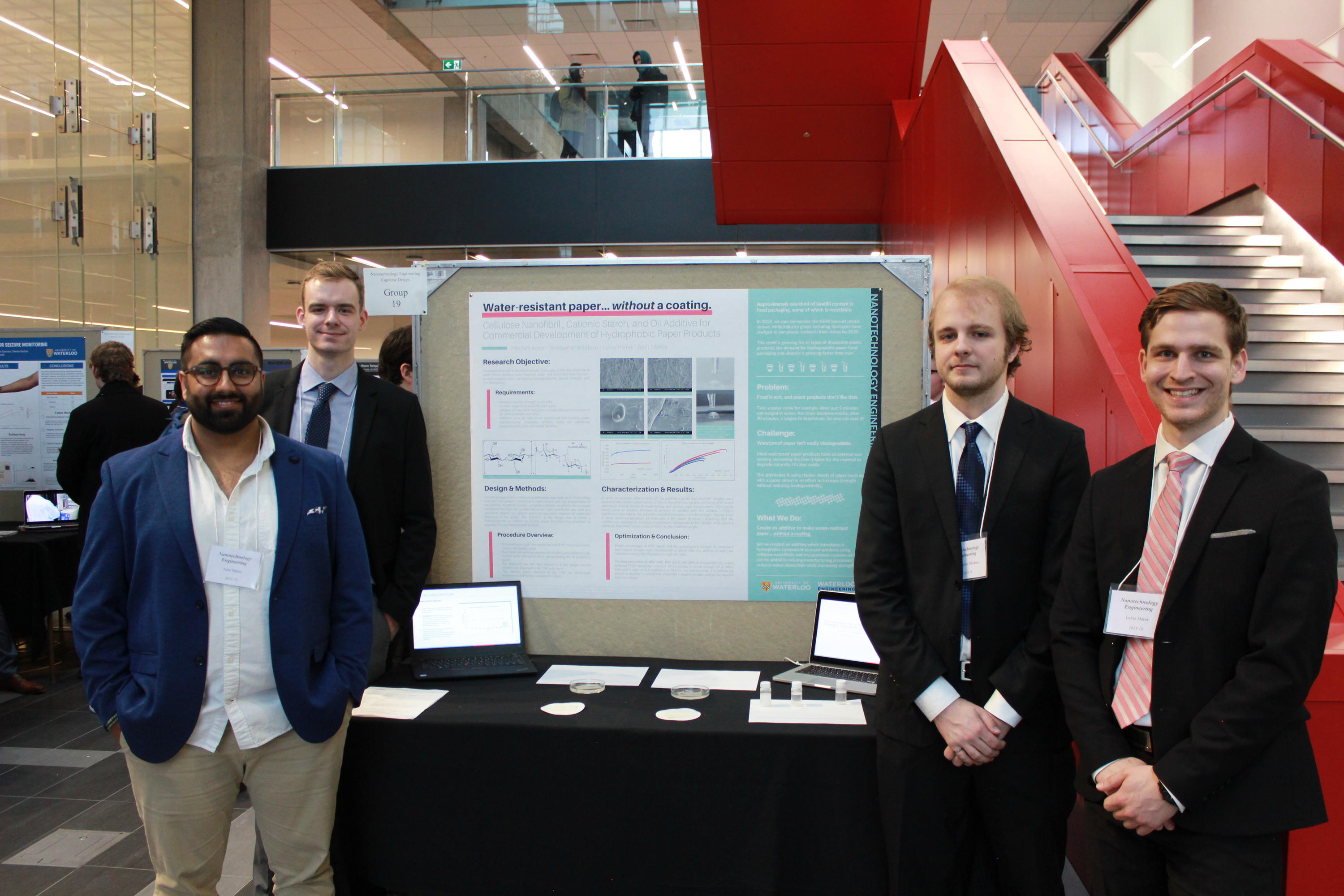 Team 19 students with their project poster at the 2019 Capstone Design Symposium.