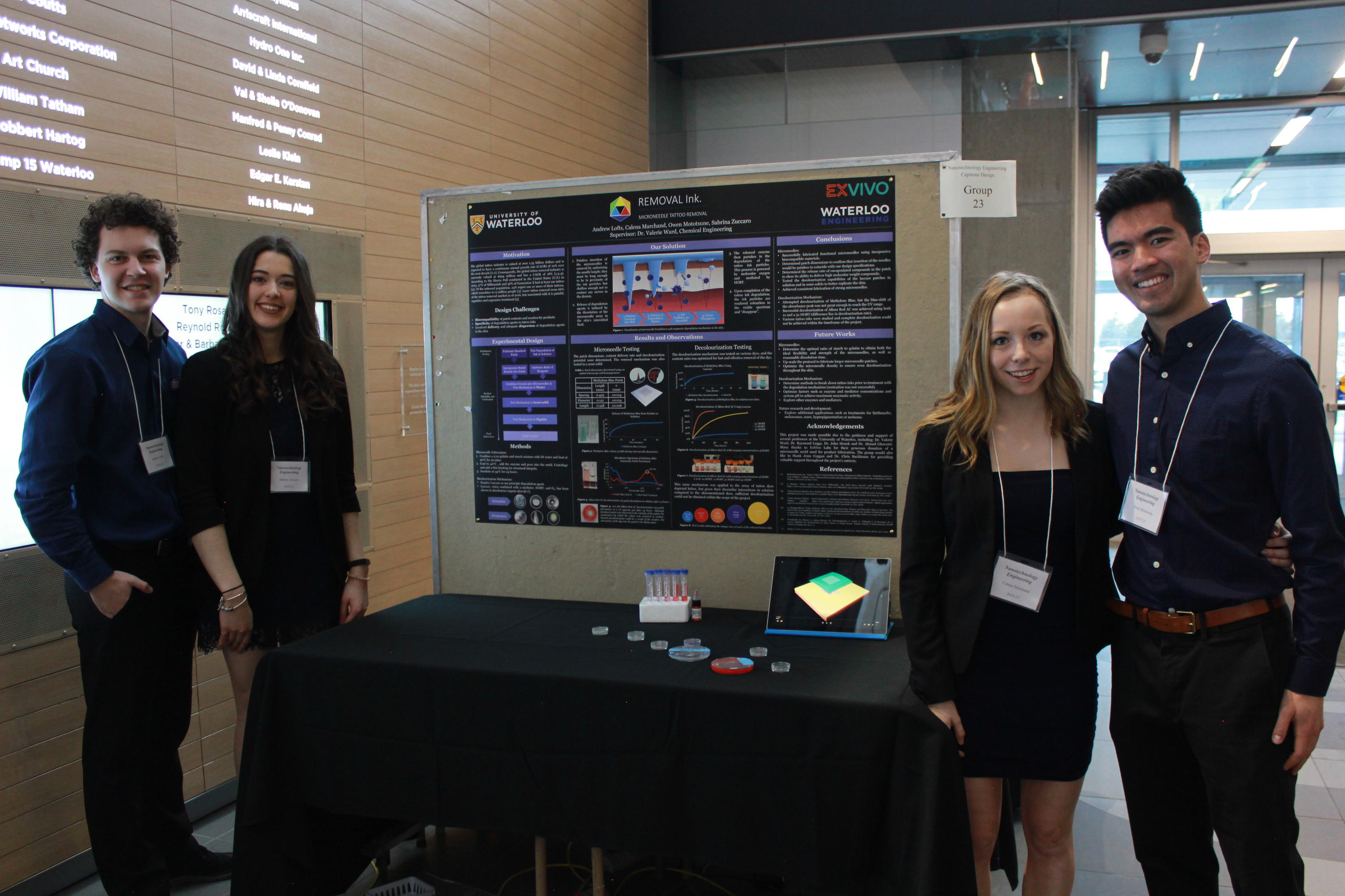 Team 23 students with their project poster at the 2019 Capstone Design Symposium.