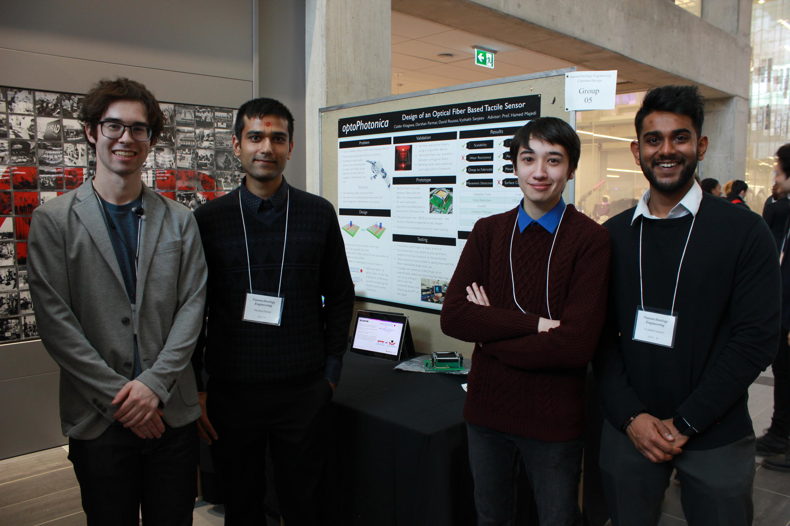 Team 5 students with their project poster at the 2019 Capstone Design Symposium.