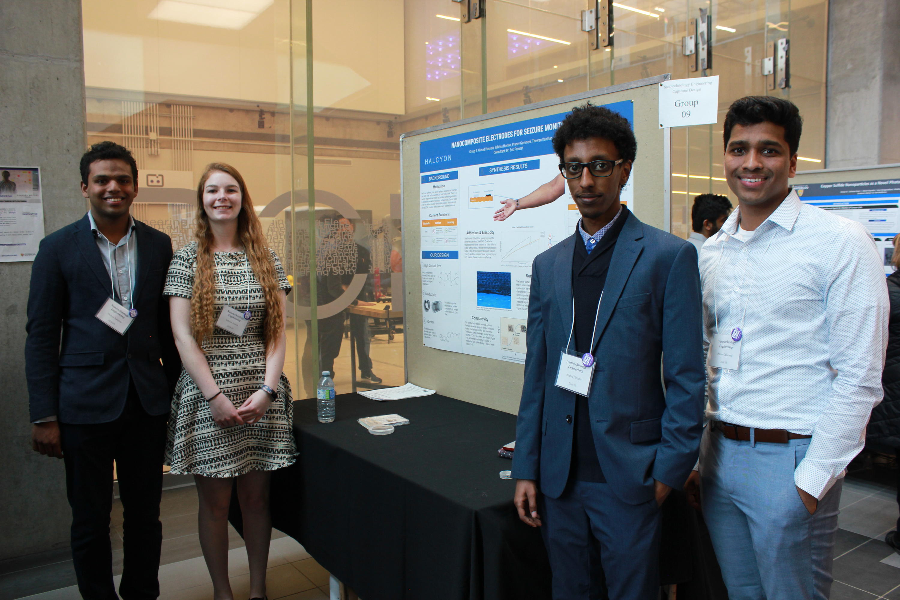Team 9 students with their project poster at the 2019 Capstone Design Symposium.