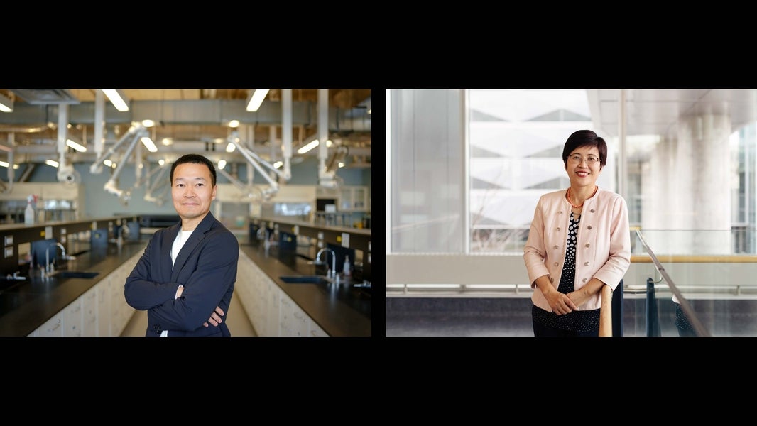 an man with crossed arms and a woman in a pink jacket and glasses