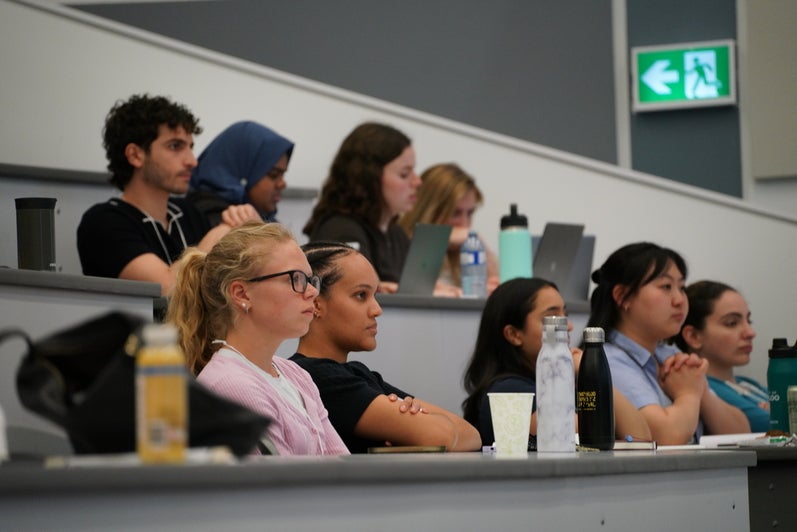 The audience listening to a presentation at the Symposium on Aging Research 2025.