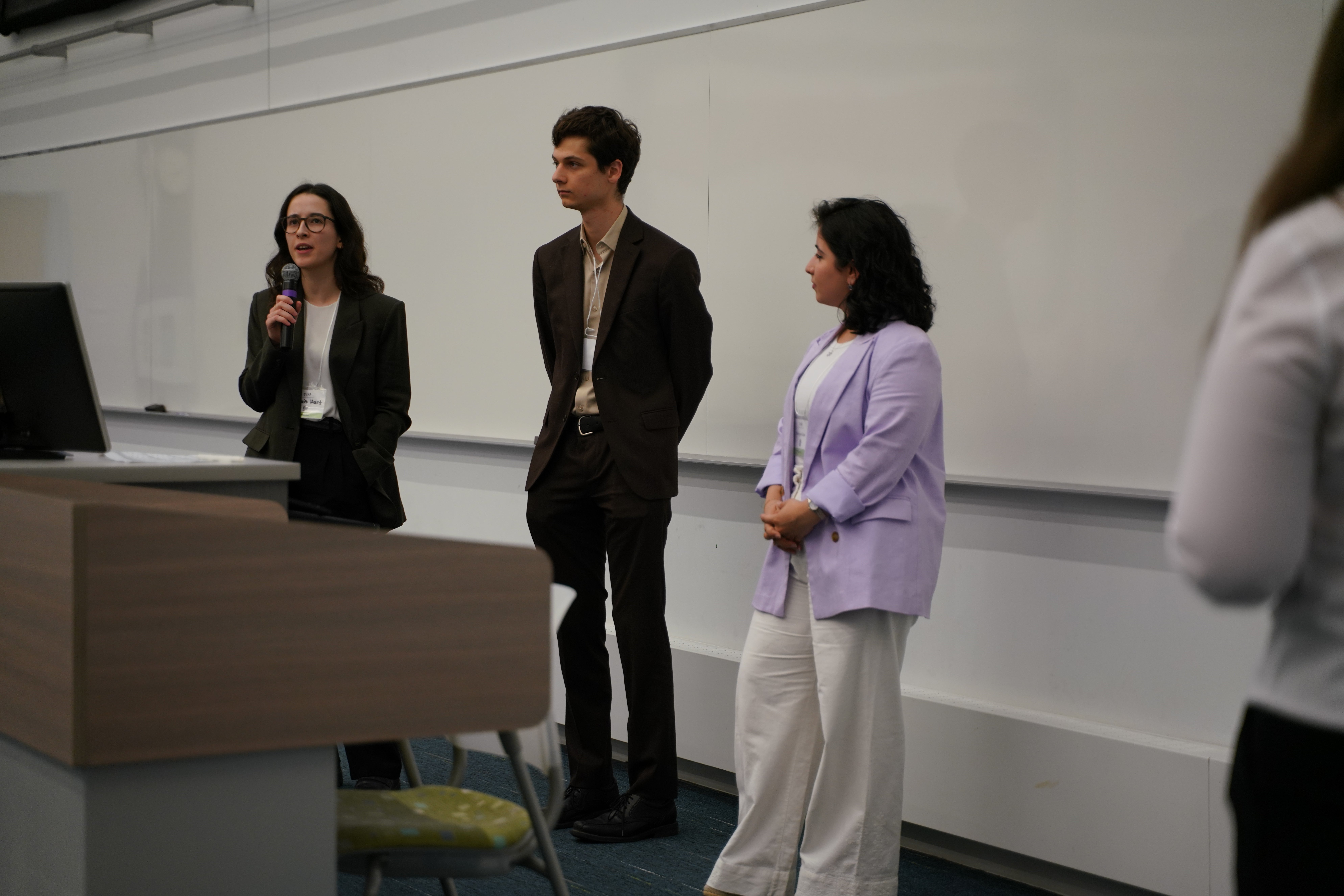 Presenters answer questions during the discussion panel period of the 2026 Symposium on Aging Research