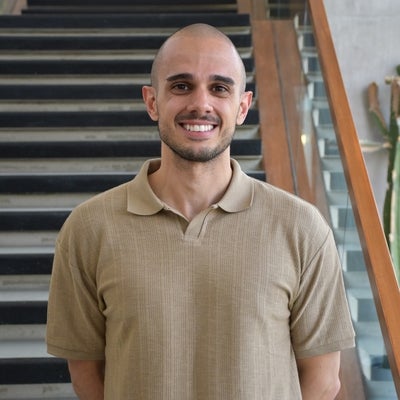 A headshot of programming team member Arthur Casagrande Pinto.