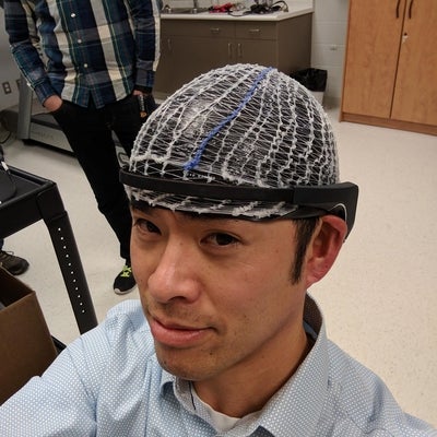 Professor Tung with special head gear 