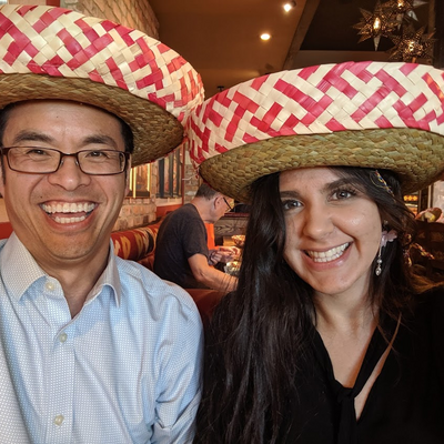 Professor Tung wearing Sombrero with a team member