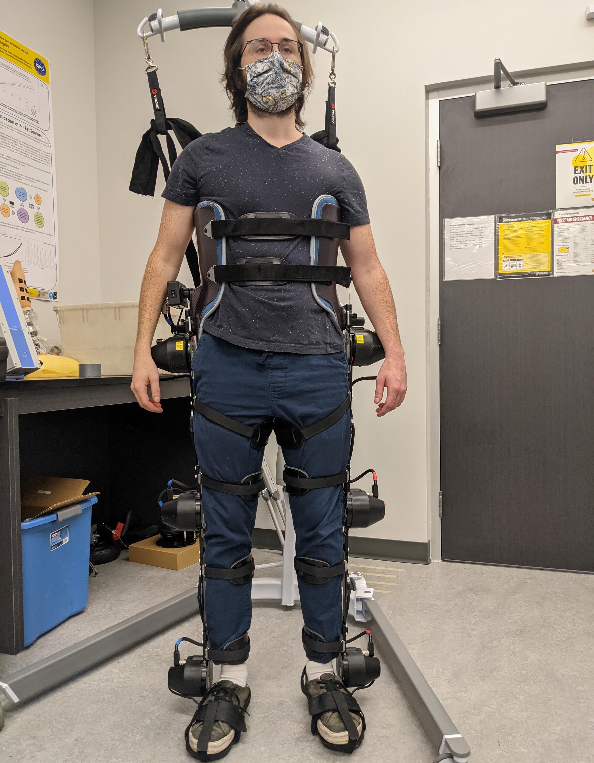 Lab member wearing an exoskeleton