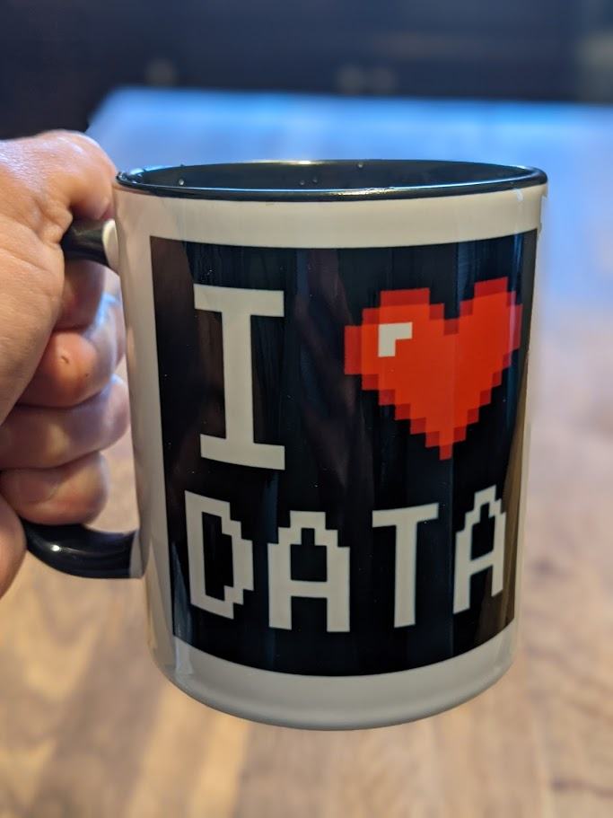 a cup that said I love data