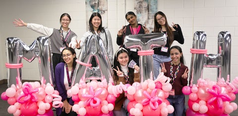students with math balloons