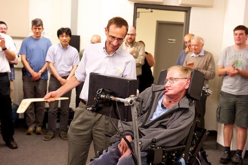 Founding Executive Director of IQC Raymond Laflamme presents Hawking with a boomerang.
