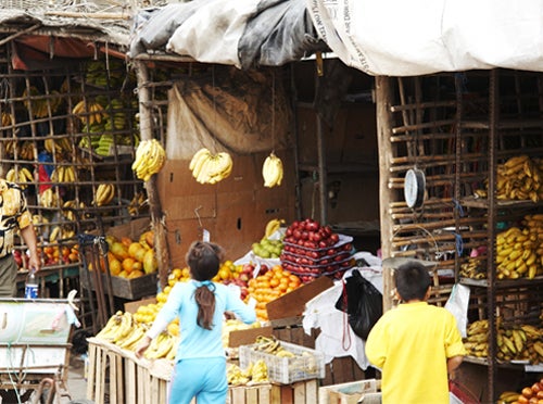 Children shopping in a market