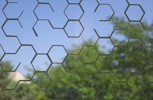 QNC window with hexagonal decoration