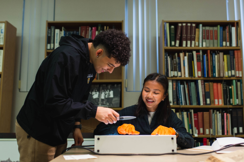 Students conduct research in the rare book room