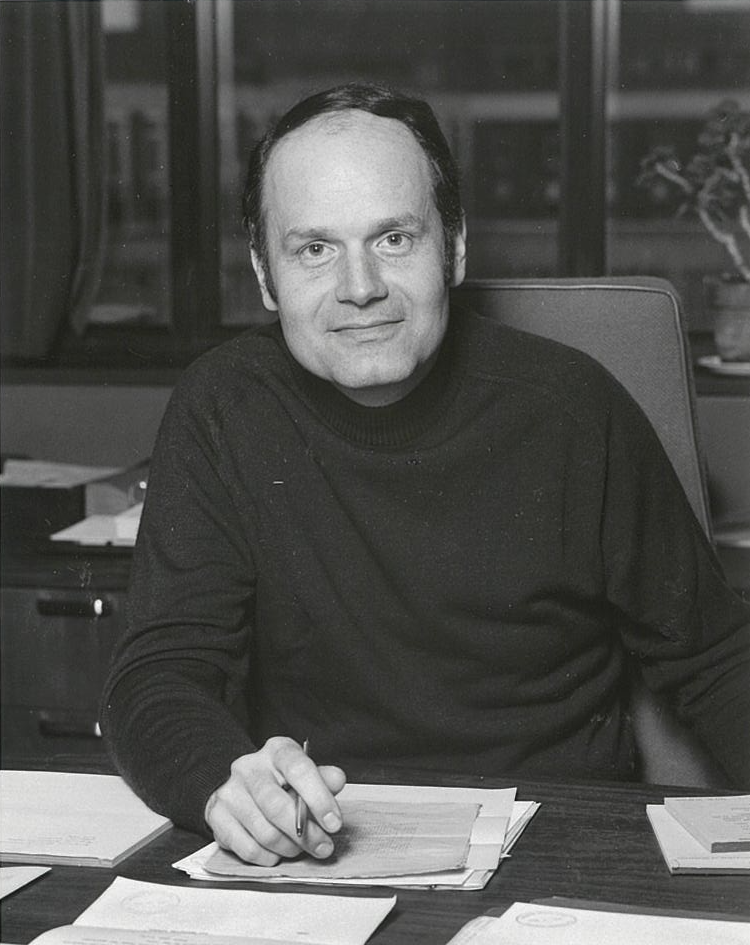 Thomas Bzrustowski working behind a desk