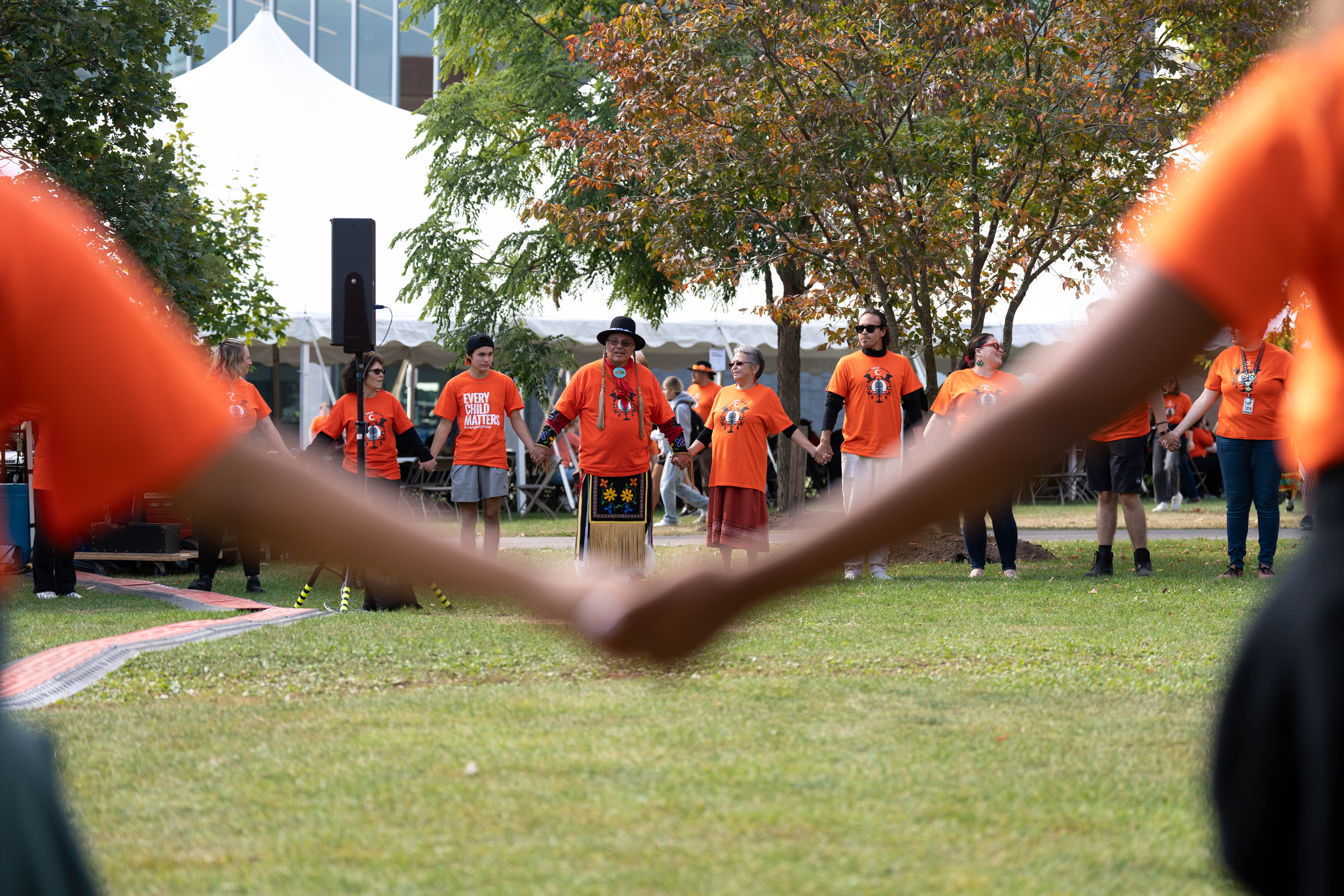 Waterloo community participate in a dance circle