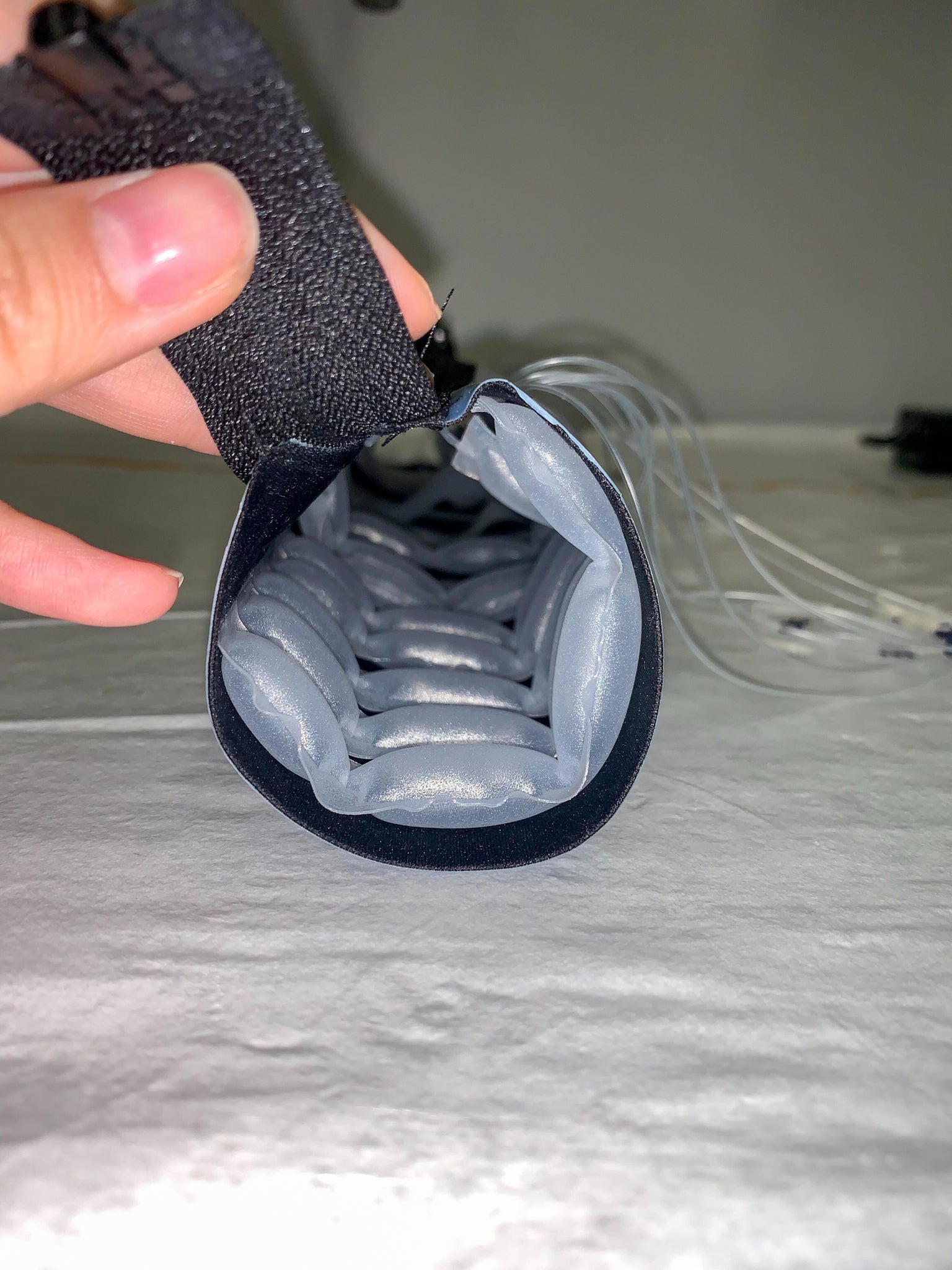 Interior view of the soft-robotic compression sleeve with inflatable balloons that provide customizable targeted compression