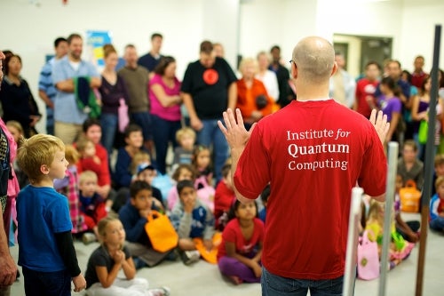 Instructor leads open house at the Institute for Quantum Computing