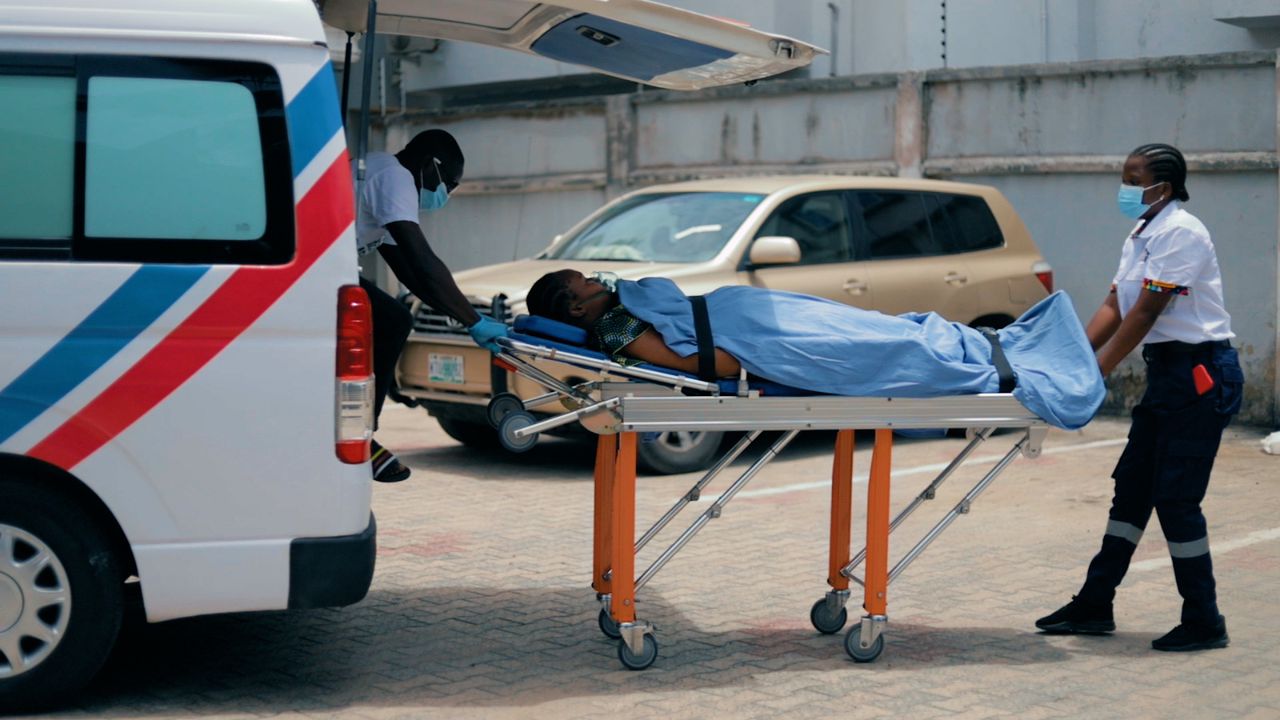 Patient being transferred into an ambulance