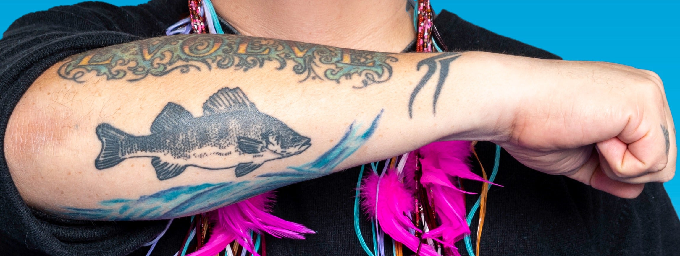 Fish tattoo on forearm