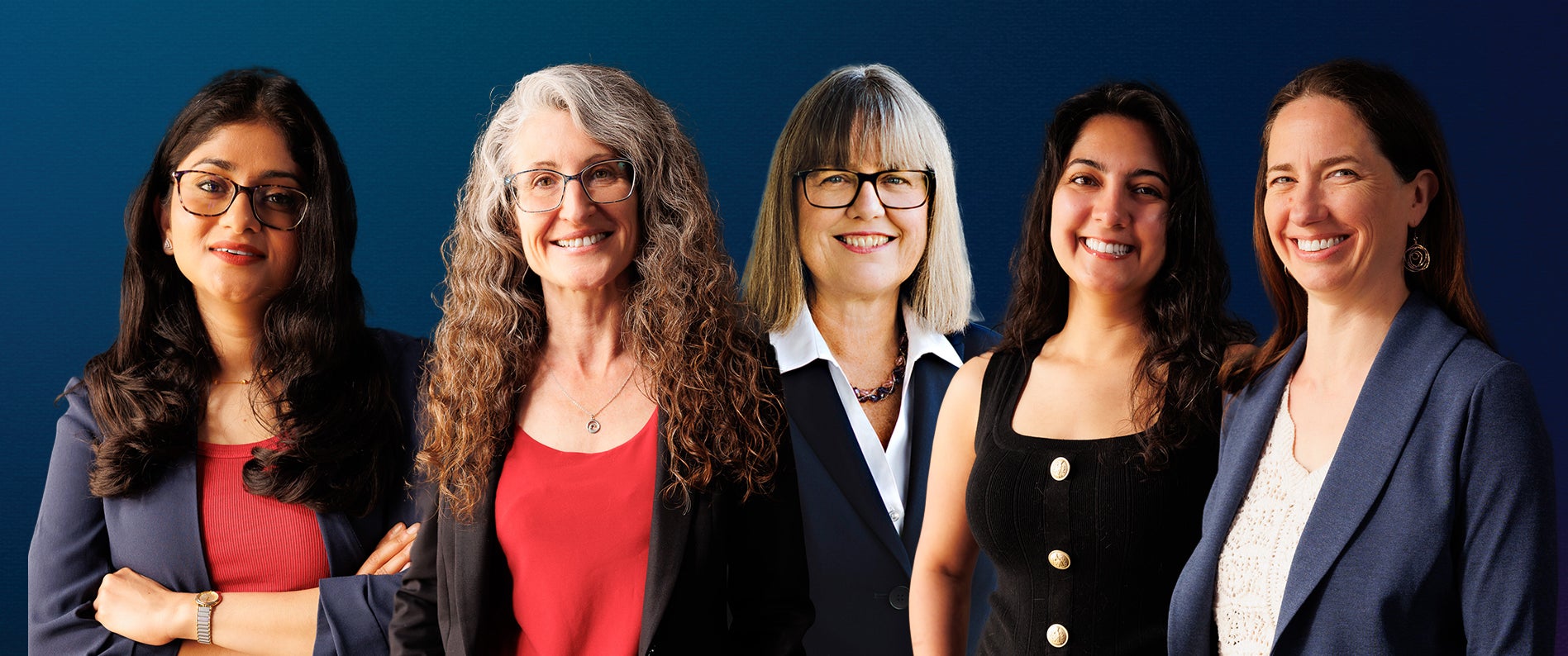 Group of five women in front of a gradient background