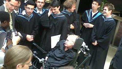Hawking meeting with recent grads at convocation ceremony at the Perimeter Institute.