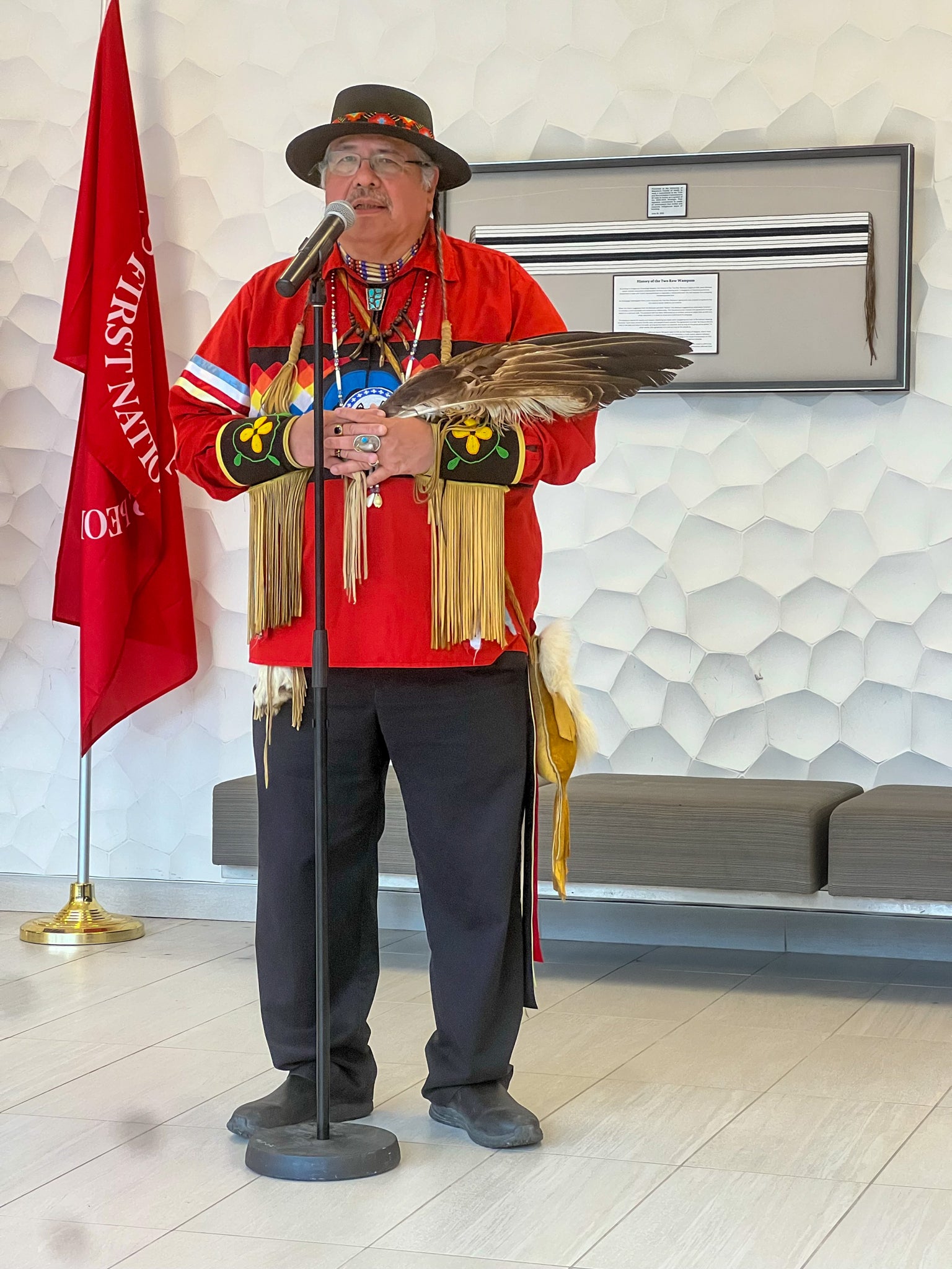 Elder Myeengun Henry leading the Red Dress Day commemoration ceremony