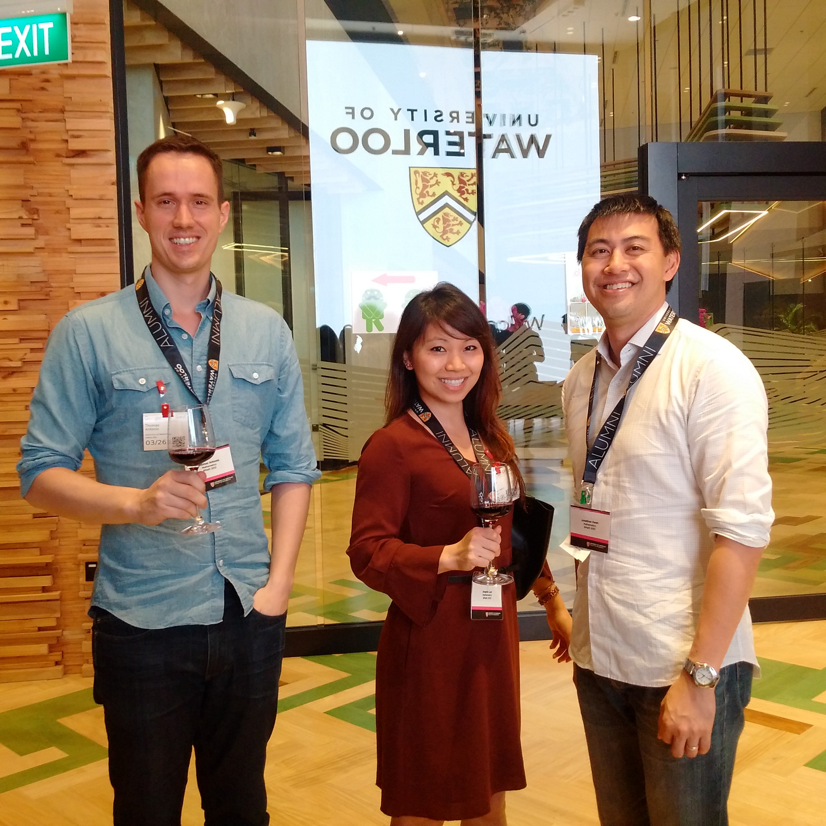 Jon Kwan (right) and fellow alumni at the Waterloo Singapore event.