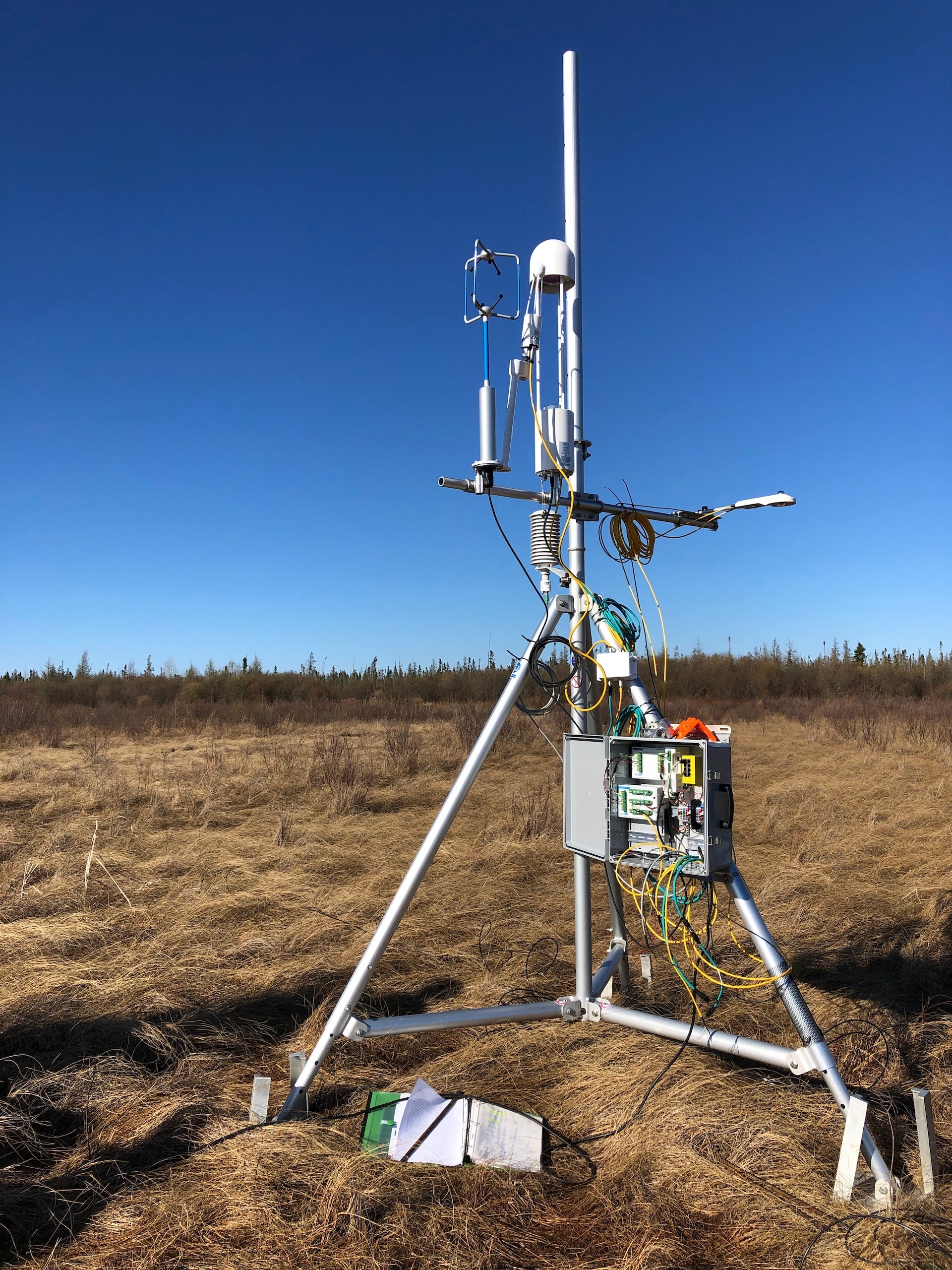 An eddy covariance tower in the middle of a field in South Julius, Manitoba