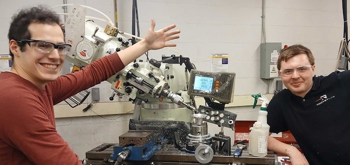 students in the machine shop