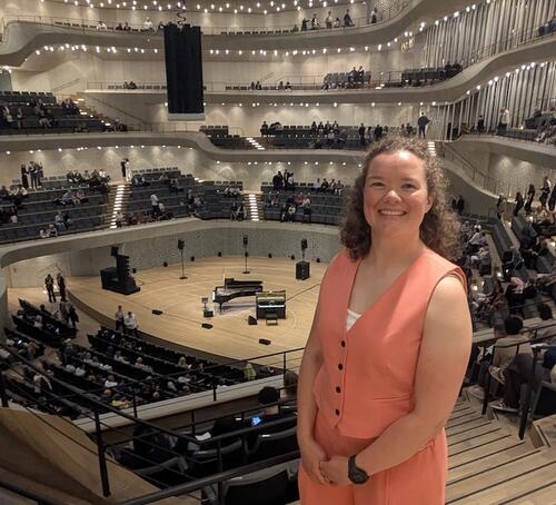 woman in recital hall