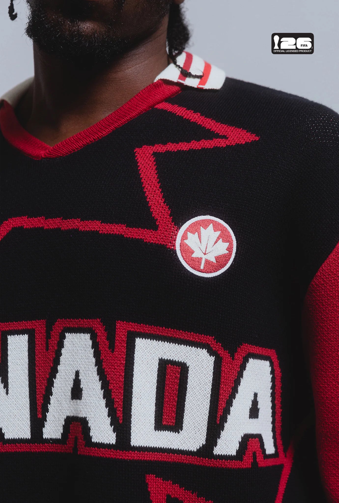 Person wearing Canadian sweater