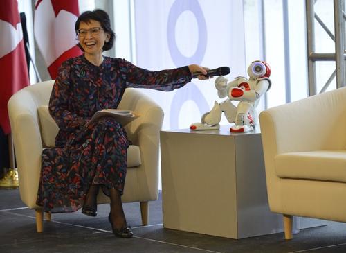 Pearl Sullivan, dean of Waterloo Engineering, interviews humanoid robot Nao 