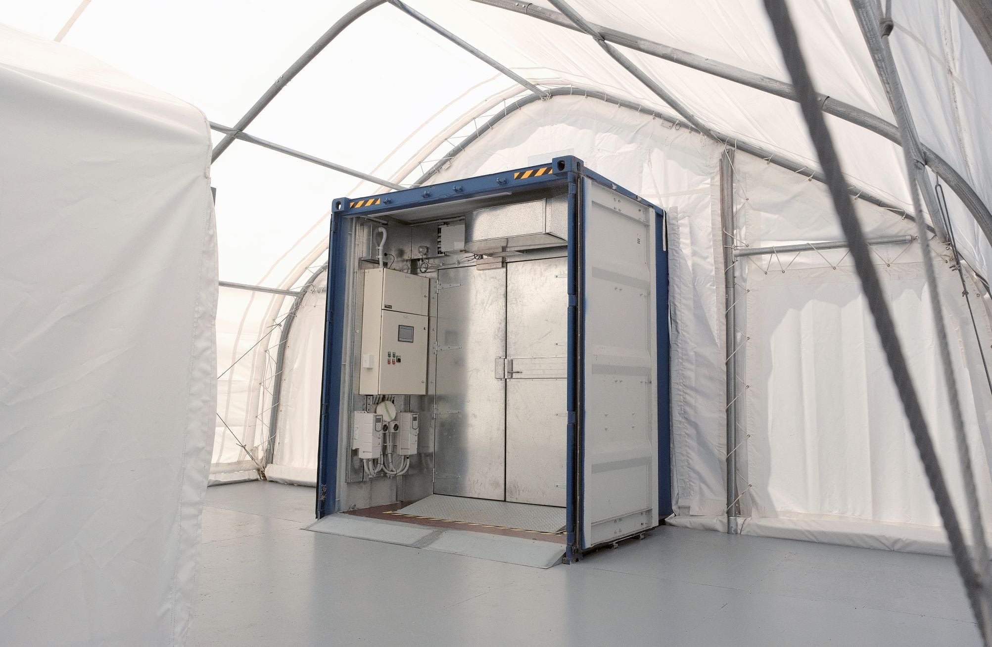 The door to a mobile disinfection system for PPE that was built in a storage container.