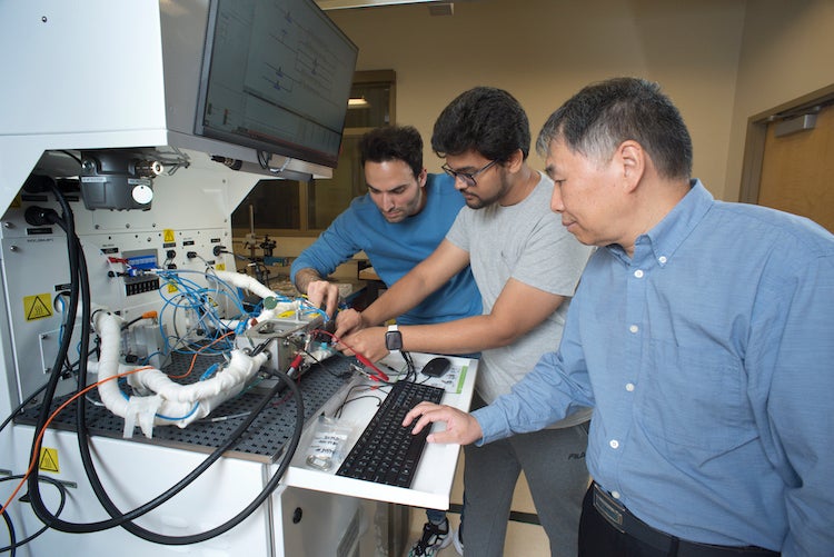 Dr. Xianguo Li with research team