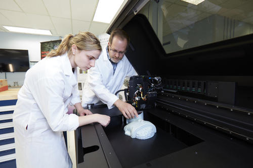 Managing director Mark Barfoot (right) and co-op student Agata Jarkiewicz (left) work in the MSAM Lab.