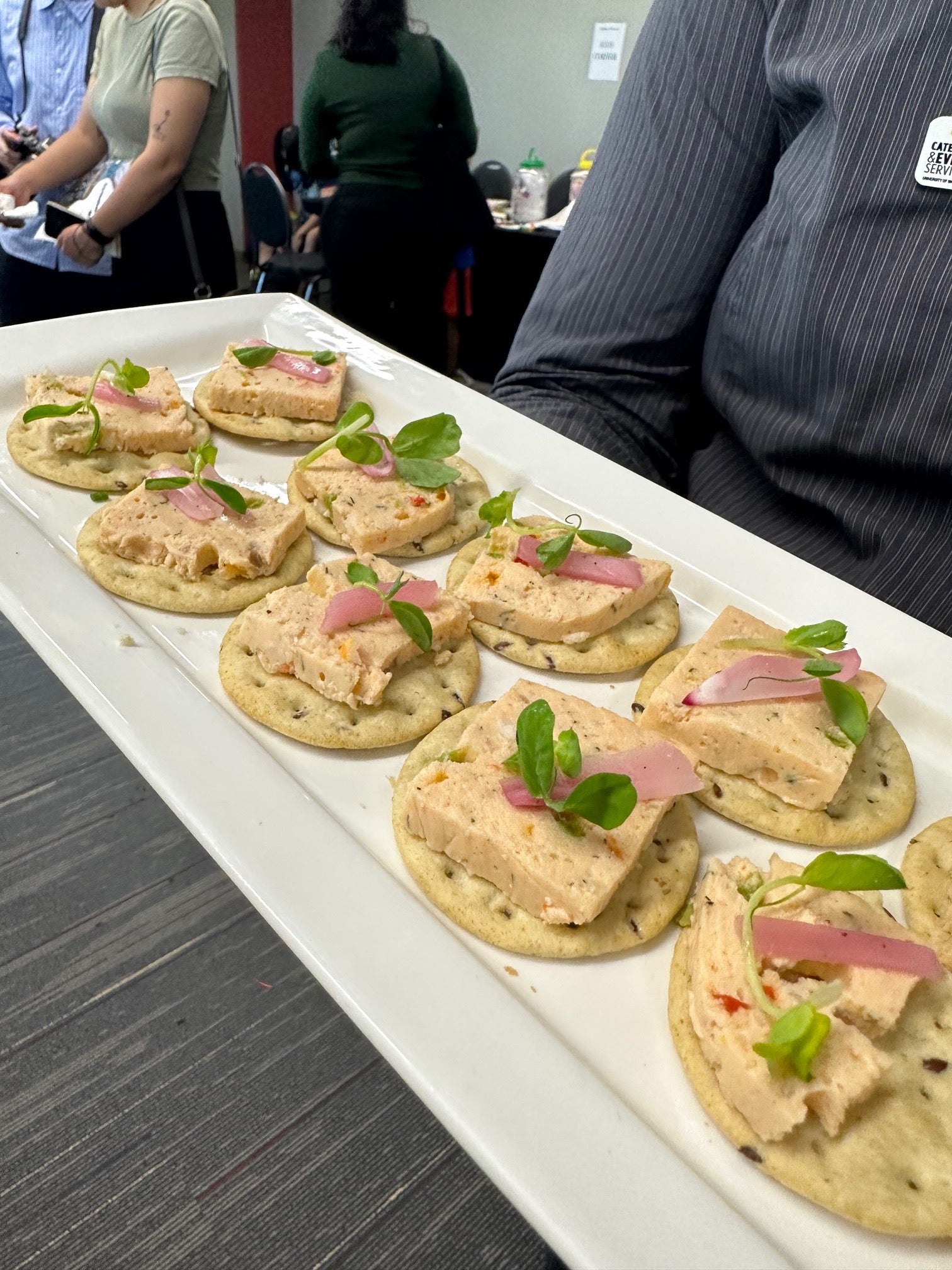 Salmon mousse on crackers