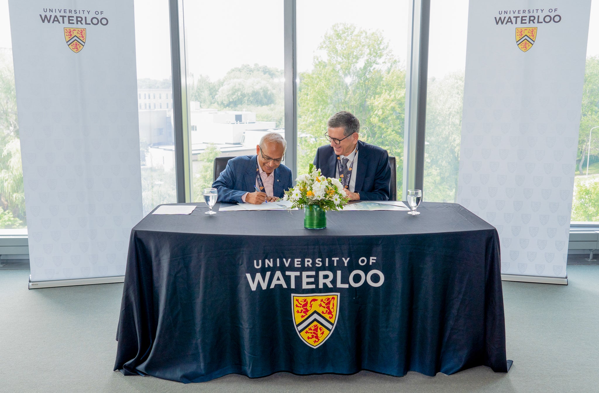President and Vice-Chancellor, Vivek Goel, and representative from the Dieter Schwarz Foundation