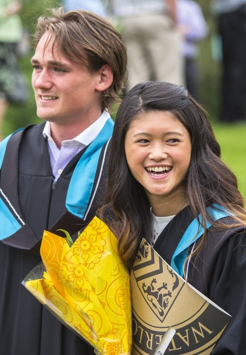 A young man and woman at convocation