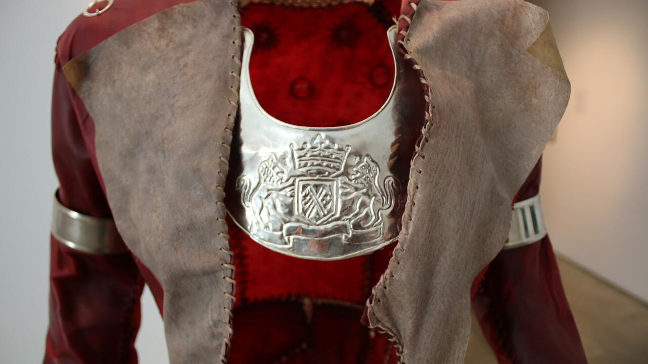 Close-up of The Redcoat showing rawhide and silver materials