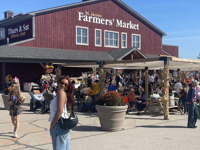 Areena poses in front of St. Jacob's Market