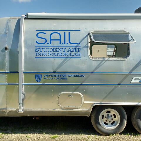 Airstream trailer with SAIL logo printed on its side