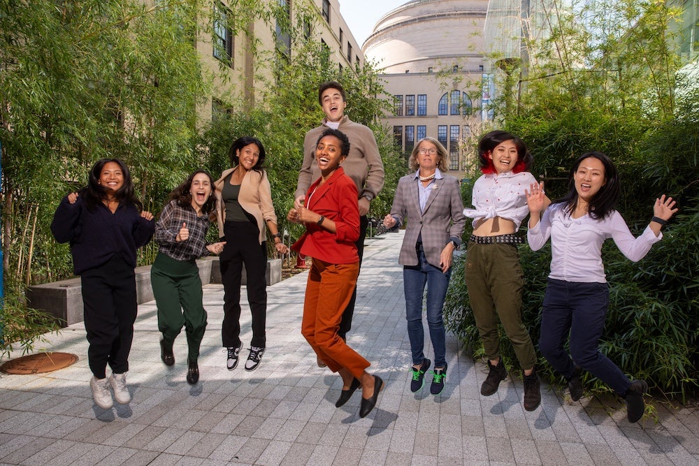 Group of people leaping in the air