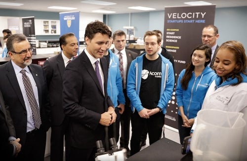 Justin Trudeau gets a demonstration from a Velocity company in the new science lab