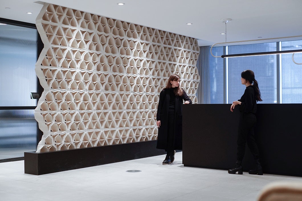 Hive, a privacy wall made of 175 unique clay masonry units, was installed in a downtown Toronto office.