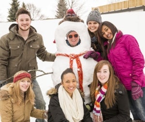 Waterloo students pose with snowman