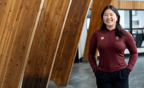 Diane Choi poses while wearing COC uniform