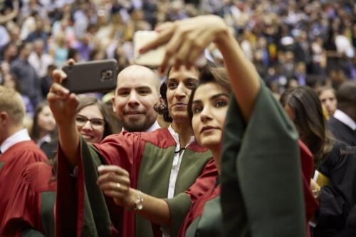 PhD students taking a selfie during convocation