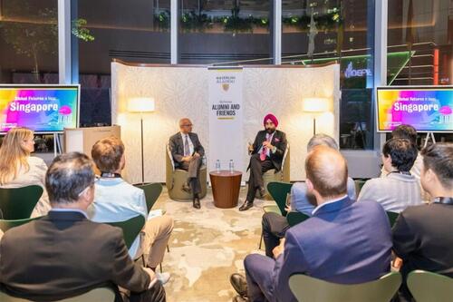 Goel and Bachher speaking at the event in Singapore