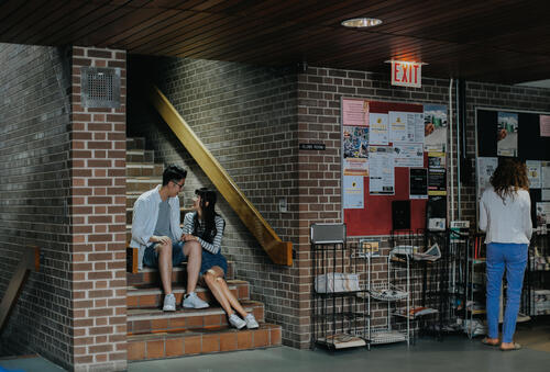 Couple sitting in Environment 1.